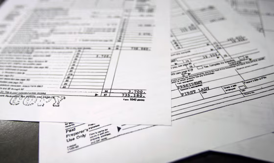 Copies of President Bush's and first lady Laura Bush's 2005 tax returns released by the White House are shown in Washington on&nbsp;Friday. It shows an adjusted gross income of $735,180.