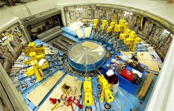 Yellow hydraulic lifts sit on top of the mercury target building at the Oak Ridge National Laboratory's Spallation Neutron Source project in Tennessee earlier this year.