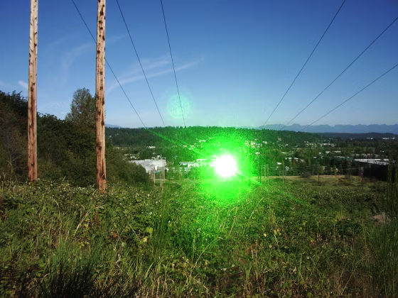 B.E. Meyers, the company that makes a laser used by U.S. troops in Iraq, said this photo shows the green beam from 330 yards away.