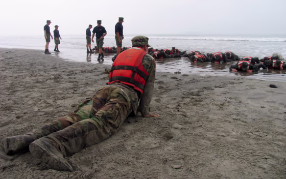 U.S. Navy Sea, Air, Land (SEAL) recruits training on the beach at the Naval Special Warfare Center in Coronado, California&nbsp;during "Hell Week." 