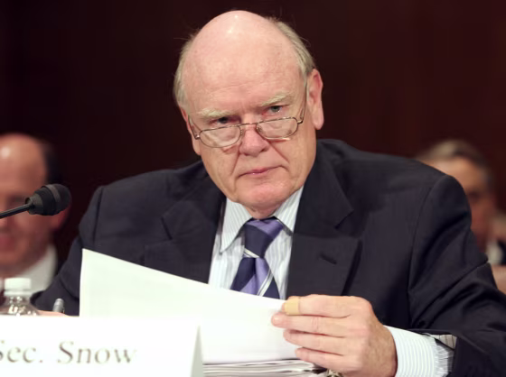 US Treasury Secretary John Snow peers ov