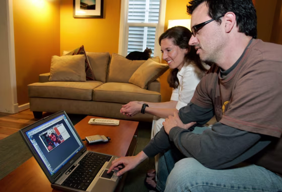 “We’re in our 30s, so it’s not like we need a lot of stuff,” says Jen Crane, who with her fiancé Tom Frohlich check the "Girls on the Run" Web site. They are asking their wedding guests to donate to the nonprofit instead of giving a gift.