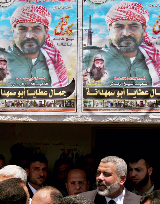 Palestinian Authority Prime Minister Ismail Haniyeh speaks to a group of government employees. Thousands of desperate&nbsp;civil&nbsp;servants received about $300 in emergency payments Monday. 