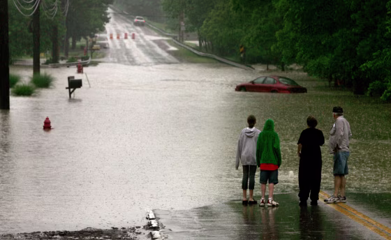 Flooding like this street in Bedford Heights, a Cleveland suburb,&nbsp;cut&nbsp;off areas across Ohio on Thursday. 