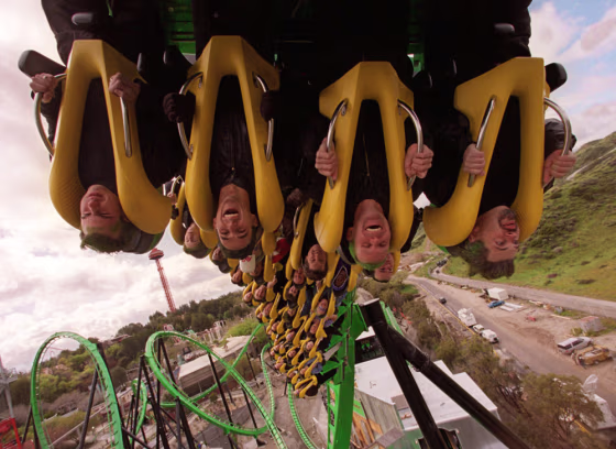 Six Flags Inc. is considering selling some of its amusement parks, including Magic Mountain and Hurricane Harbor, to ease its debt load.