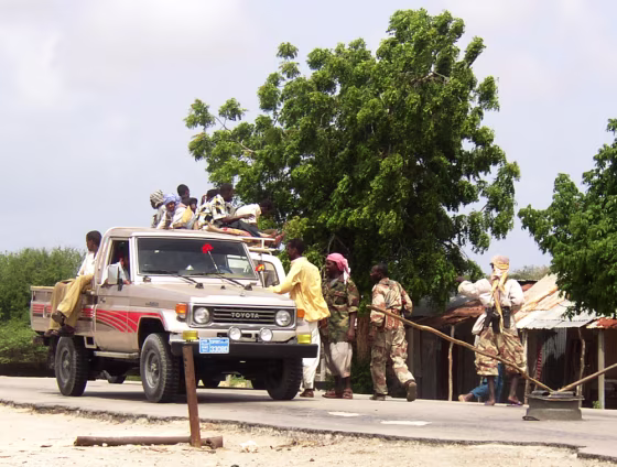 Members of the Islamic Courts Union search a truck at a checkpoint they took over from the Habar Gidir clan after a fire fight broke out between the two groups in Mogadishu, Somalia.&nbsp; 