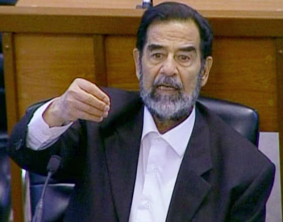 Saddam Hussein appears in a Baghdad courtroom on Wednesday.