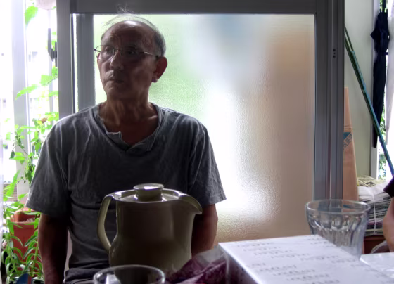 Gosuke Kakizaki, 73, sits in a subsidized housing unit in west Tokyo. One of a soaring number of seniors on welfare in Japan, he has had cut back as his benefits have been shashed over the past three years.