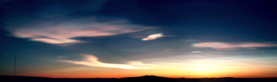 Rare mother-of-pearl coloured clouds caused by extreme weather conditions are seen above Australia's Mawson Station in Antarctica