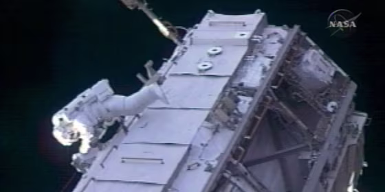 Astronaut Thomas Reiter works on the international space station during Thursday's spacewalk.
