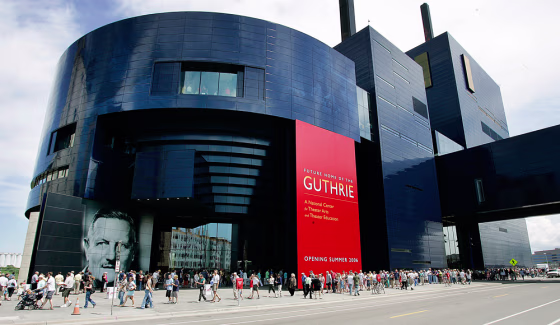 A long line snakes in front of the new Guthrie Theater at the Community Celebration on June 25, which was part of the opening weekend for the new home for the Theater near the Mississippi River in Minneapolis.