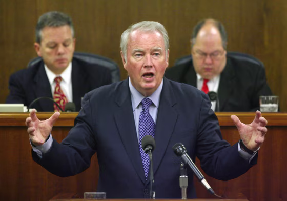 Alaska Gov. Frank Murkowski speaks to a joint session of the Alaska State Legislature Wednesday about BP's decision to shut down the Prudhoe Bay oil field.