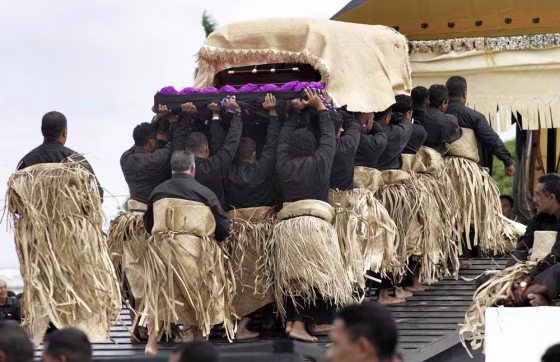 Pallbearers carry the casket containing the body of the late King Taufa'ahau Tupou IV&nbsp;to the royal tomb for a state funeral in Nuku'alofa on Tuesday.