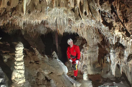 A researcher explores part of the new cave system discovered at Sequoia and Kings Canyon National Park in California. 