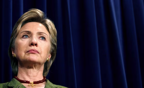 Senator Hillary Clinton listens to remarks from fellow Democratic senators in Washington