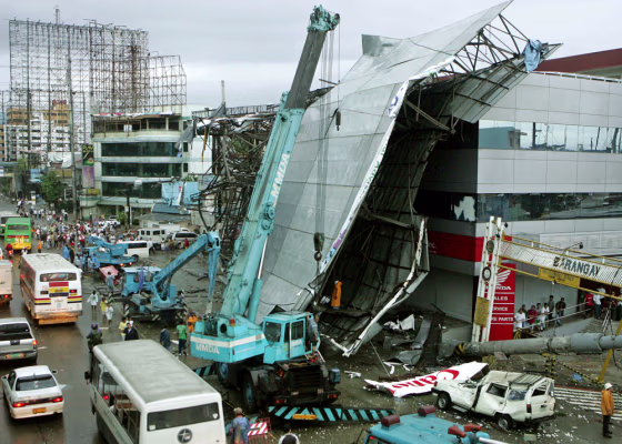 This giant billboard was blown down by the typhoon that drenched Manila on Thursday.