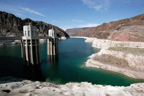 The&nbsp;drop in water levels due to drought on Lake Mead can be seen by the white ring around the shore at Hoover Dam in this July 21 photo, taken&nbsp;in Boulder City, Nev. Boaters and swimmers have grown accustomed to the rings around Lake Mead and Lake Powell in Arizona and Utah that show where the water used to be, before drought brought the levels down. 