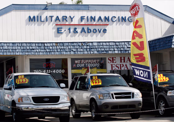A used car dealership in Oceanside, Calif., offers financing to members of the armed forces. The lot is one of many businesses in downtown Oceanside offering credit to Marines from nearby Camp Pendleton.