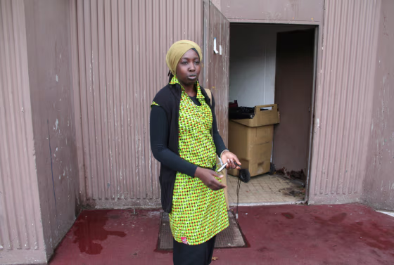 Aissata Tounkara, 29, says that when she was a youngster, all the rooms where she did activities — studying, dancing — took place next to the garbage bins. " When you grow up here, you always have the feeling that you are being associated with garbage," she said.