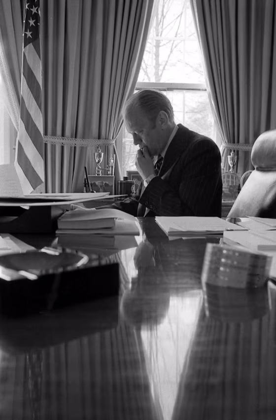 File photo of former US President Ford sitting in the Oval Office