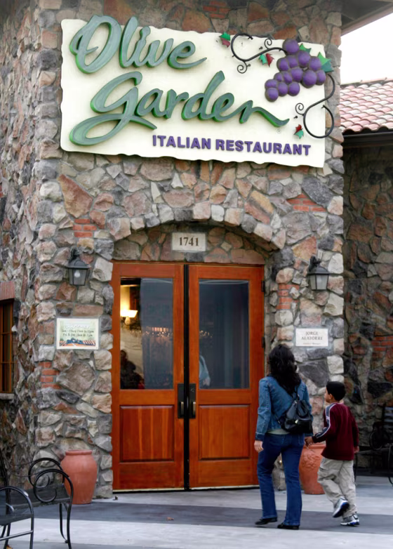 Customers are shown outside an Olive Garden restaurant in Burbank,California