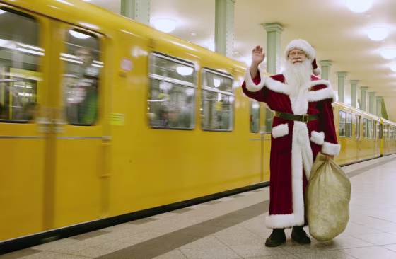 A man dressed as Father Christmas, or Sa