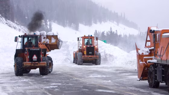 Avalanches aren't just a back country danger. Here crews remove snow from Interstate 40 west of Denver&nbsp;on Jan. 6 after a huge avalanche swept two&nbsp;cars off the road. Eight people were rescued from the buried vehicles.