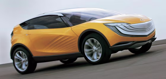 The Mazda Hakaze concept has rippled surfaces along its fender line that were&nbsp;inspired by the windswept surface of a dune.