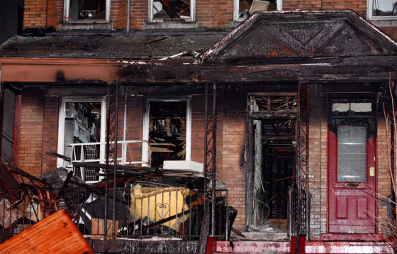 A 3-alarm fire that began late Wednesday night in the Bronx left behind this charred wreckage. At least nine people, including eight children, died in the blaze.