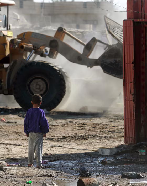 Iraqi Army Demolishes Shopping Area in Tense Baghdad Neighborhood