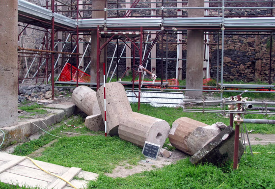A column lies in pieces on the grounds of an ancient Roman villa on Wednesday, within a closed section of the Pompeii archaeological site.