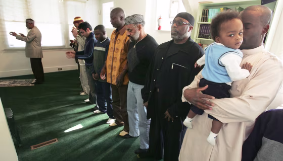 Muslim men gather at Masjid al-Mumin mosque for Friday prayers in Pittsburgh on March 9. Following what&nbsp;seems to be a trend in cities nationwide, religious leaders in&nbsp;that city and others&nbsp;have indicated an increase in black conversions to Sunni Islam since Sept. 11.