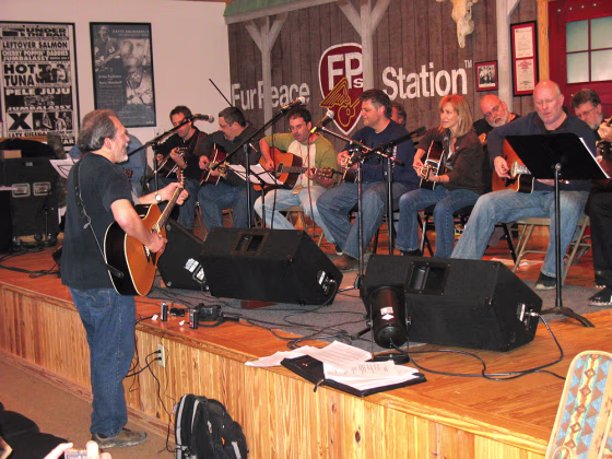 Students in Jorma Kaukonen's class often work on one particular song, then perform it together. Here Jorma leads his students in a rousing rendition of "Keep On Truckin'."