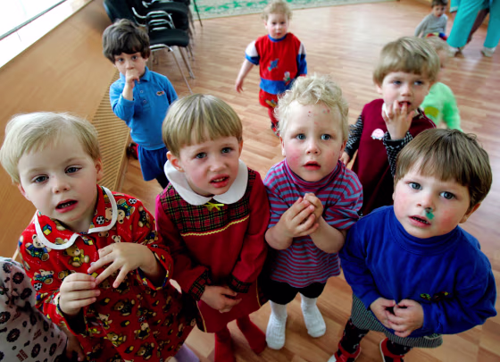 Russian orphans gather in May 2006 at the Republican Hospital for Infectious Diseases, which specializes in treating HIV-positive children in Ust-Izhora, Russia.