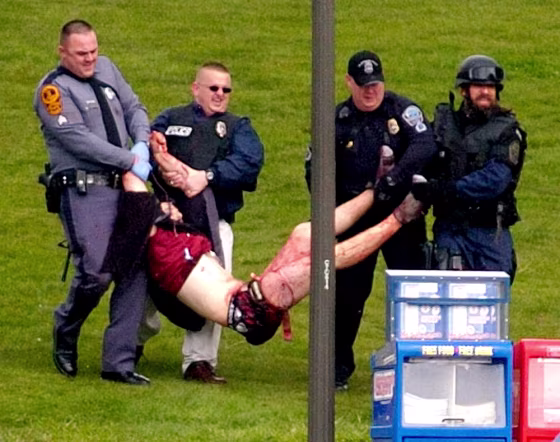 Virginia Tech student Kevin Sterne is carried out of Norris Hall on Monday, April 16, 2007.(AP Photo/The Roanoke Times, Alan Kim)
