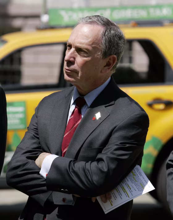 In front of a Ford Escape hybrid taxicab
