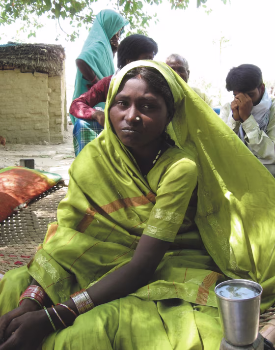 Chandrika, a young mother, who lost her two children to starvation. She attempted to get help from a health clinic. But doctors told her to leave and go "beg in the market like other dalits."