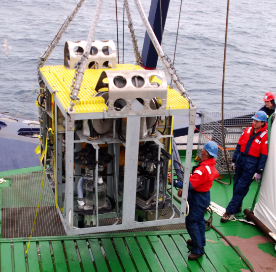 The new robotic underwater vehicle named "Camper" is maneuvered on the stern of the icebreaker Oden during a test cruise in the Arctic Ocean. Scientists plan to use it and other newly developed robots to sample new life they believe may be found along a series of underwater hot springs on rugged Gakkel Ridge in the Arctic. 
