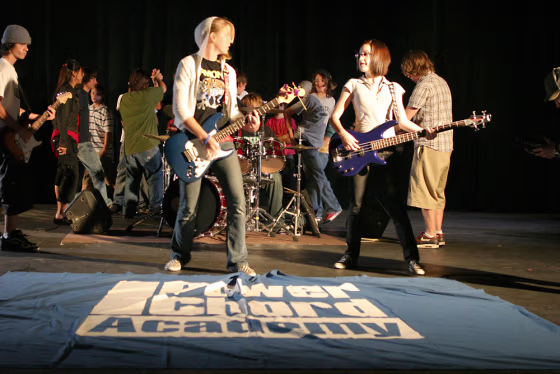 Power Chord Academy attendees rock out during a session in San Diego last year. “We immerse the kids in all aspects of music creation,” says camp spokesperson Samantha Franklin.