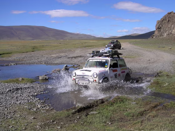 A Mini takes on Mongolian water hazards during the 2005 race.