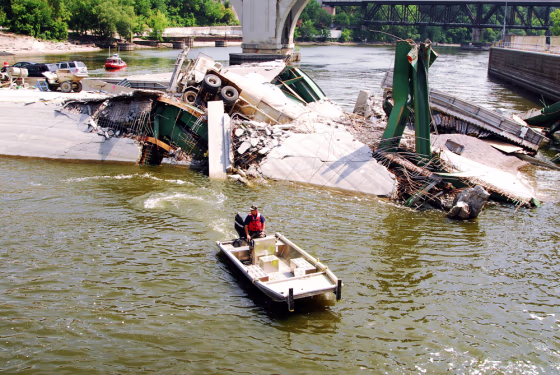 Navy Divers Investigate Site Of Bridge Collapse