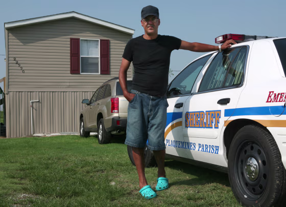 Deputy Sheriff Rogers Landry has moved across the Mississippi River from his hometown of Bohemia, La., and now lives on the west bank near Port Sulphur, La.