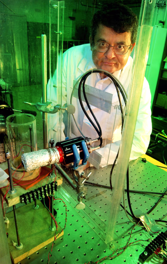 Purdue professor Rusi Taleyarkhan is shown here with a tabletop-fusion experiment in a U.S. Department of Energy facility in Oak Ridge, Tenn.
