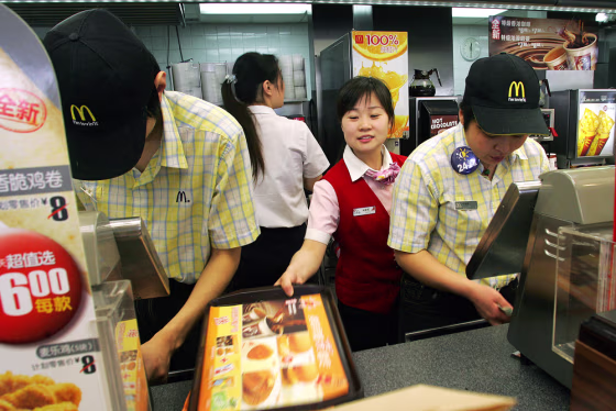 Chinese workers go about their business