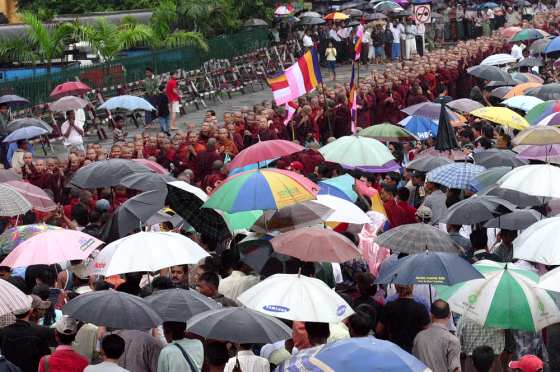 Buddhist monks gather in front of the city hall in Myanmar's largest city Yangon on Friday after marching from the famous Swedagon Pagoda. About 3,000 people including 1,500 Buddhist monks marched through the flooded streets.