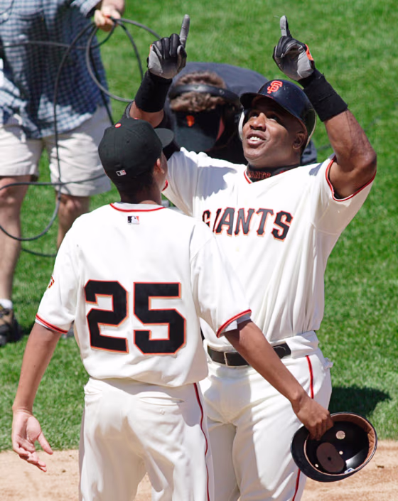 Giants Bonds celebrates his 715th career home run in San Francisco