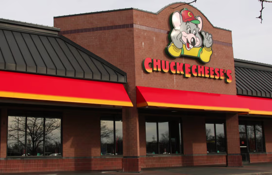 Chuck E. Cheese, the kid-friendly food and amusement chain, has agreed to be sold for nearly $1 billion