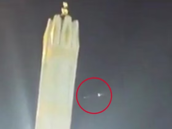 Bright lights flash in the sky over the Saudi city of Medina on Thursday night.