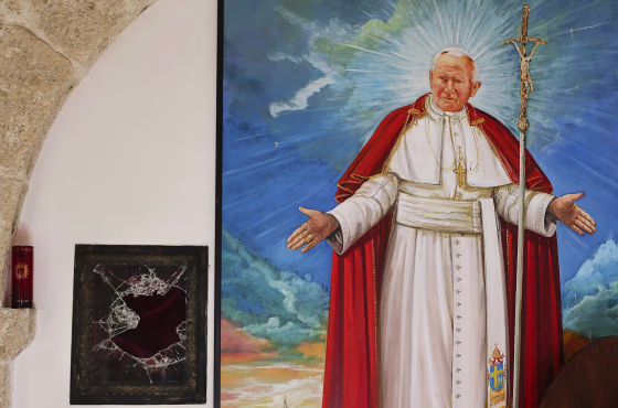 Image: Broken glass where a reliquary with the blood of the late Pope John Paul II was stolen.
