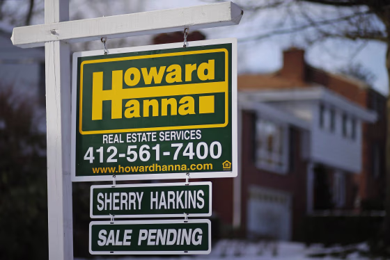 Signed contracts to buy existing homes dropped 8.7 percent in December, catching economists by surprise.